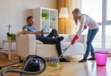 Woman,Cleaning,Home,And,Man,Doesn't,Help,Her