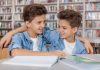 https://image.freepik.com/free-photo/happy-young-twin-brothers-laughing-hugging-library-while-doing-school-assignment-together_130388-1249.jpg