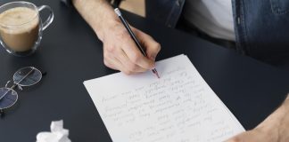 top-view-man-writing-letter