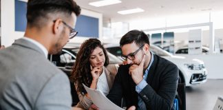 Worried,Middle,Age,Man,With,His,Wife,Buying,Car,In